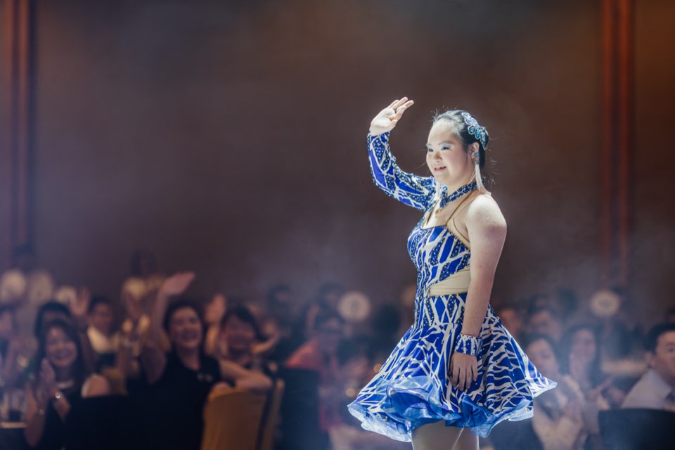 Megan Tang dancing on stage at the APSN Charity Fashion Gala 2024