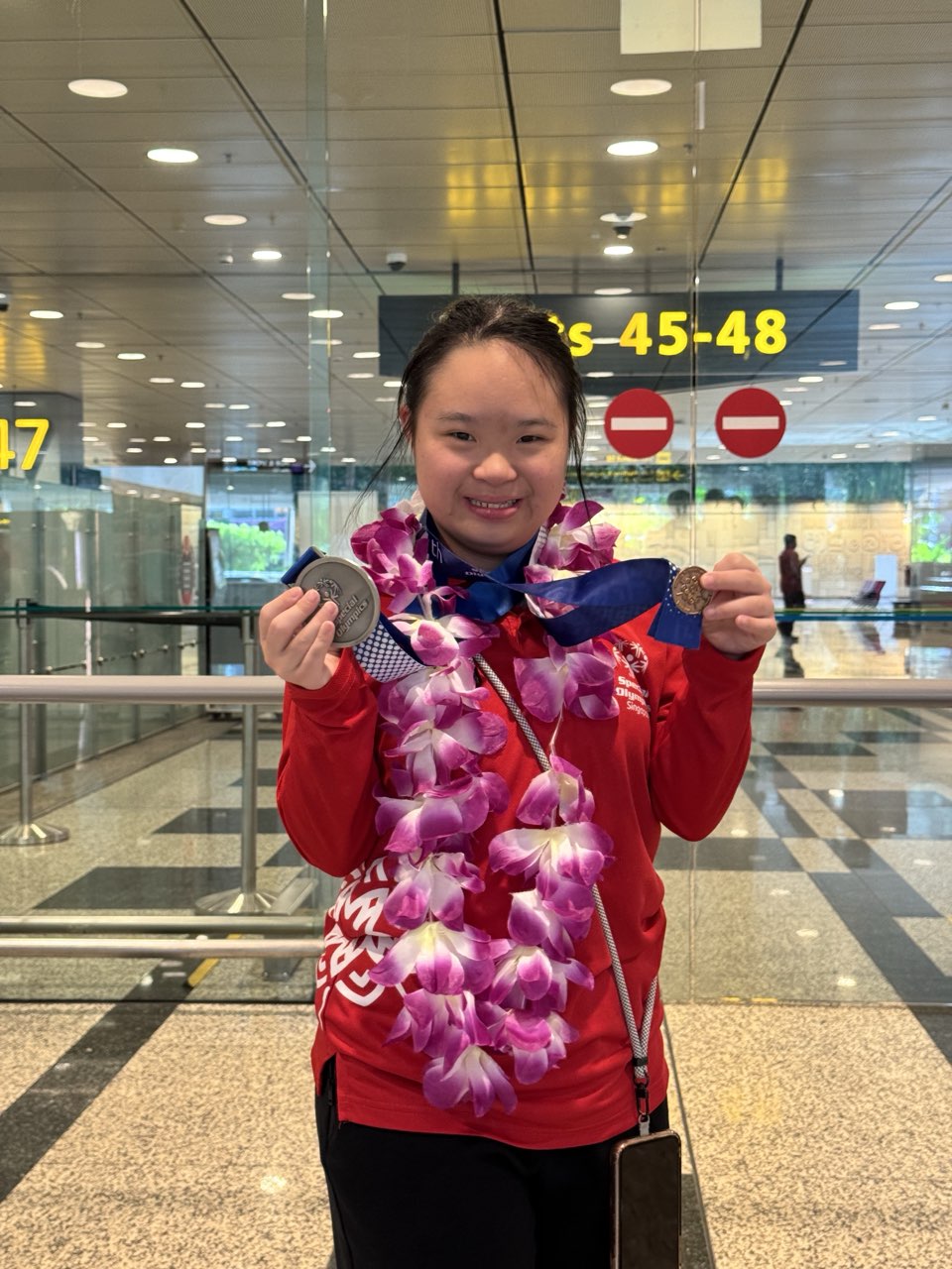 Megan Tang home from Turin with her silver medal, 2025